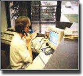 Receptionist viewing in/out board